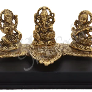 Gold plated Lakshmi Ganesh Saraswati Diya Statue on a wooden base