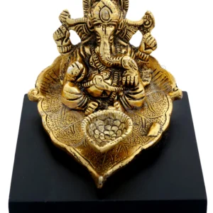 Gold plated aluminium patta ganesh statue on a polished wooden base