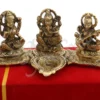 A stunning Gold Plated Lakshmi Ganesh Saraswati Gift Box, featuring three deities in a velvet box.