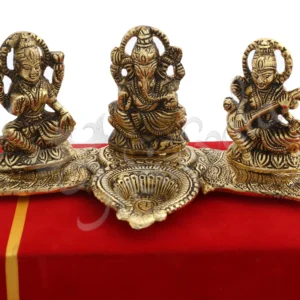 A stunning Gold Plated Lakshmi Ganesh Saraswati Gift Box, featuring three deities in a velvet box.