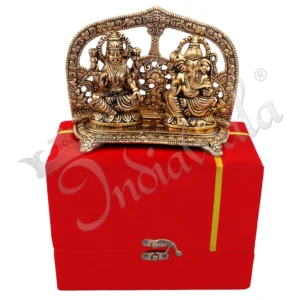 A beautifully crafted 5x6.25 Inch Gold Plated Aluminium Lakshmi Ganesh Velvet Box, showcasing intricate details of the deities.