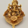 A beautifully crafted Gold Plated Aluminium Deep Patta Ganesh Gifting Statue with intricate details.
