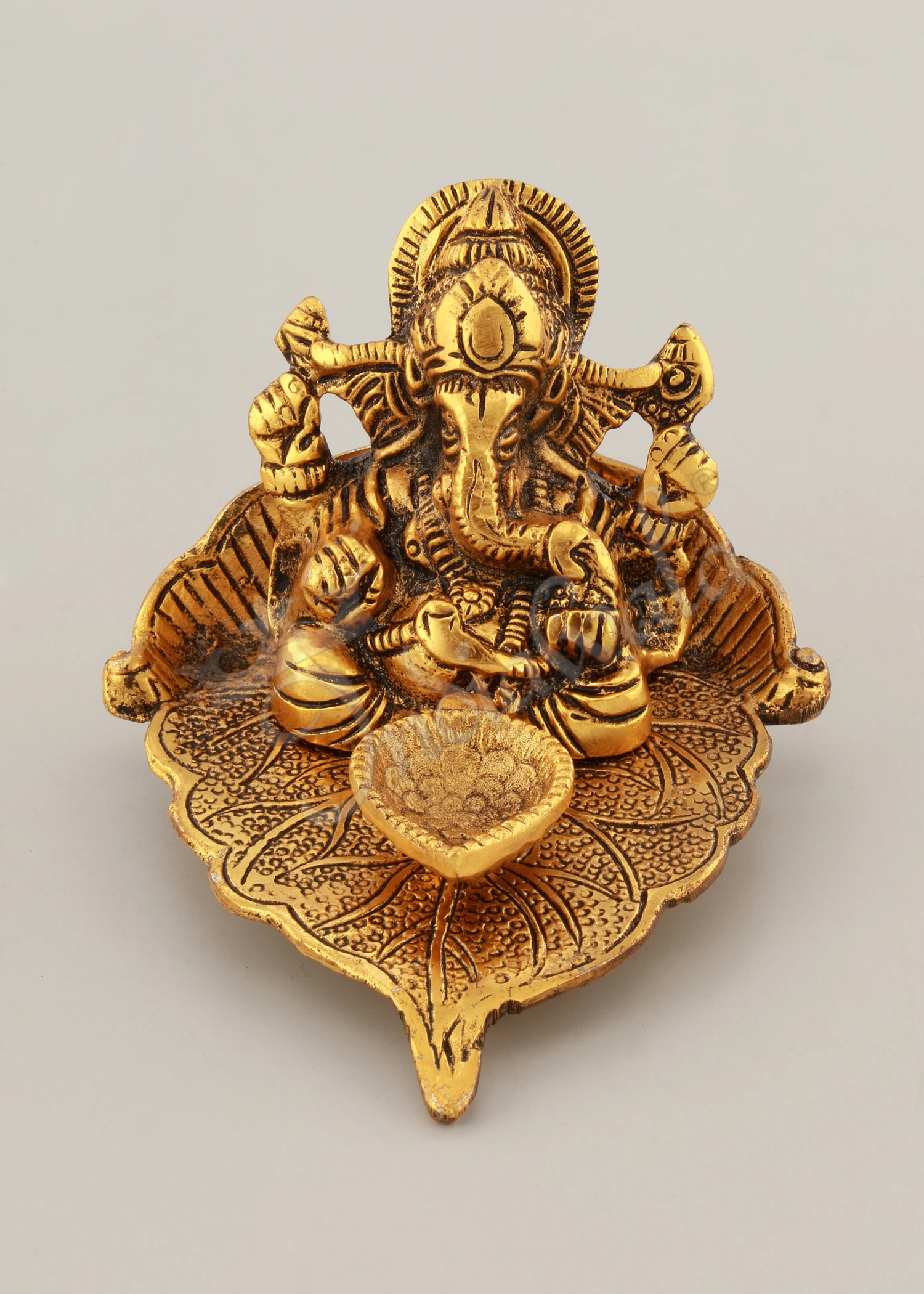 INW-15046 A beautifully crafted Gold Plated Aluminium Deep Patta Ganesh Gifting Statue with intricate details.