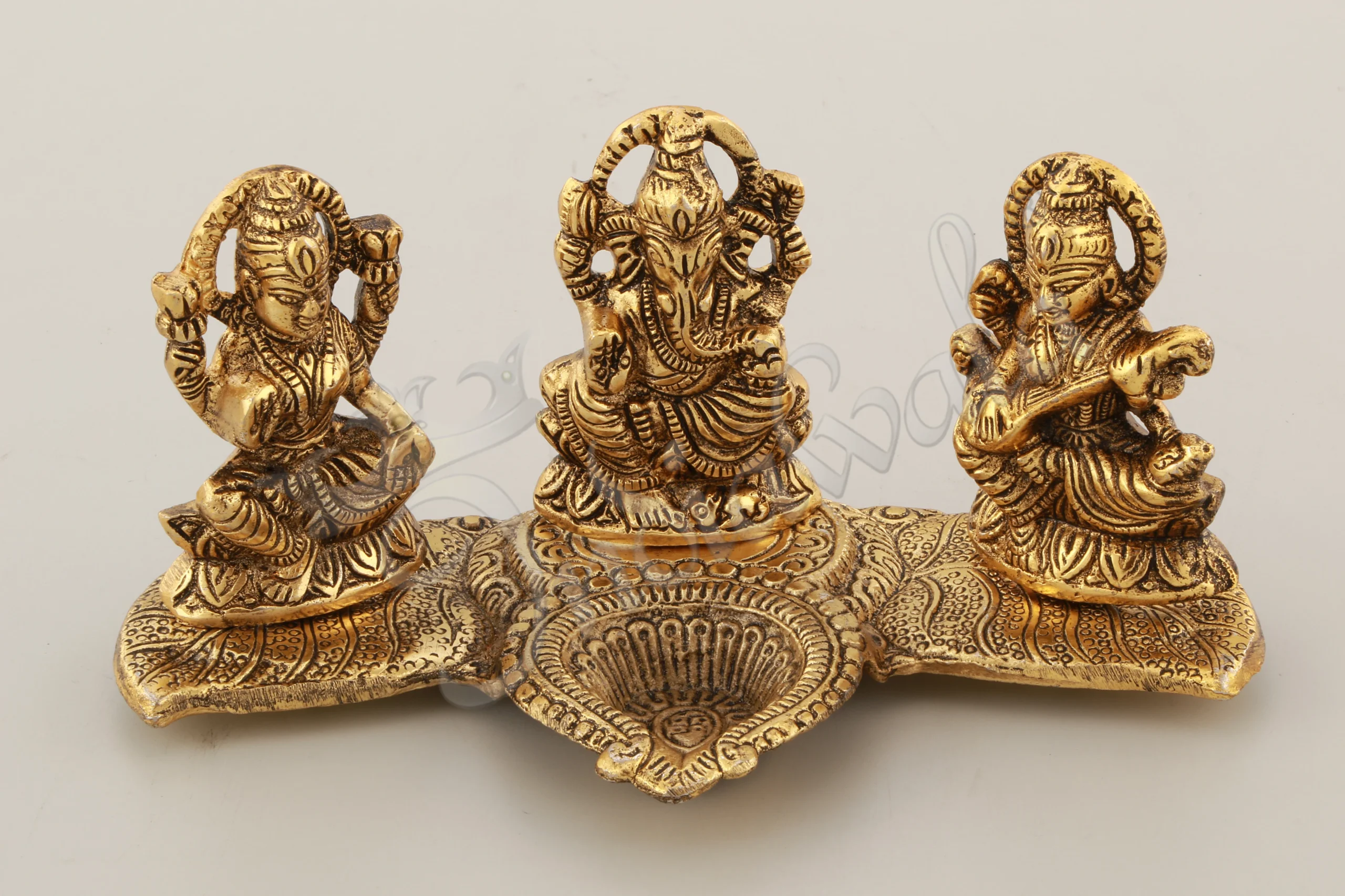 INW-15056 Gold Plated Lakshmi Ganesh Saraswati Diya Idol in premium aluminium