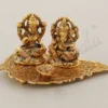 Gold Plated Lakshmi Ganesh Diya on Leaf Base for festive gifting