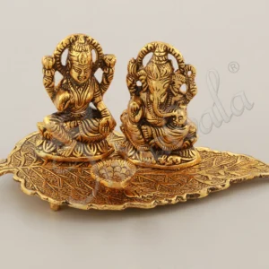 Gold Plated Lakshmi Ganesh Diya on Leaf Base for festive gifting