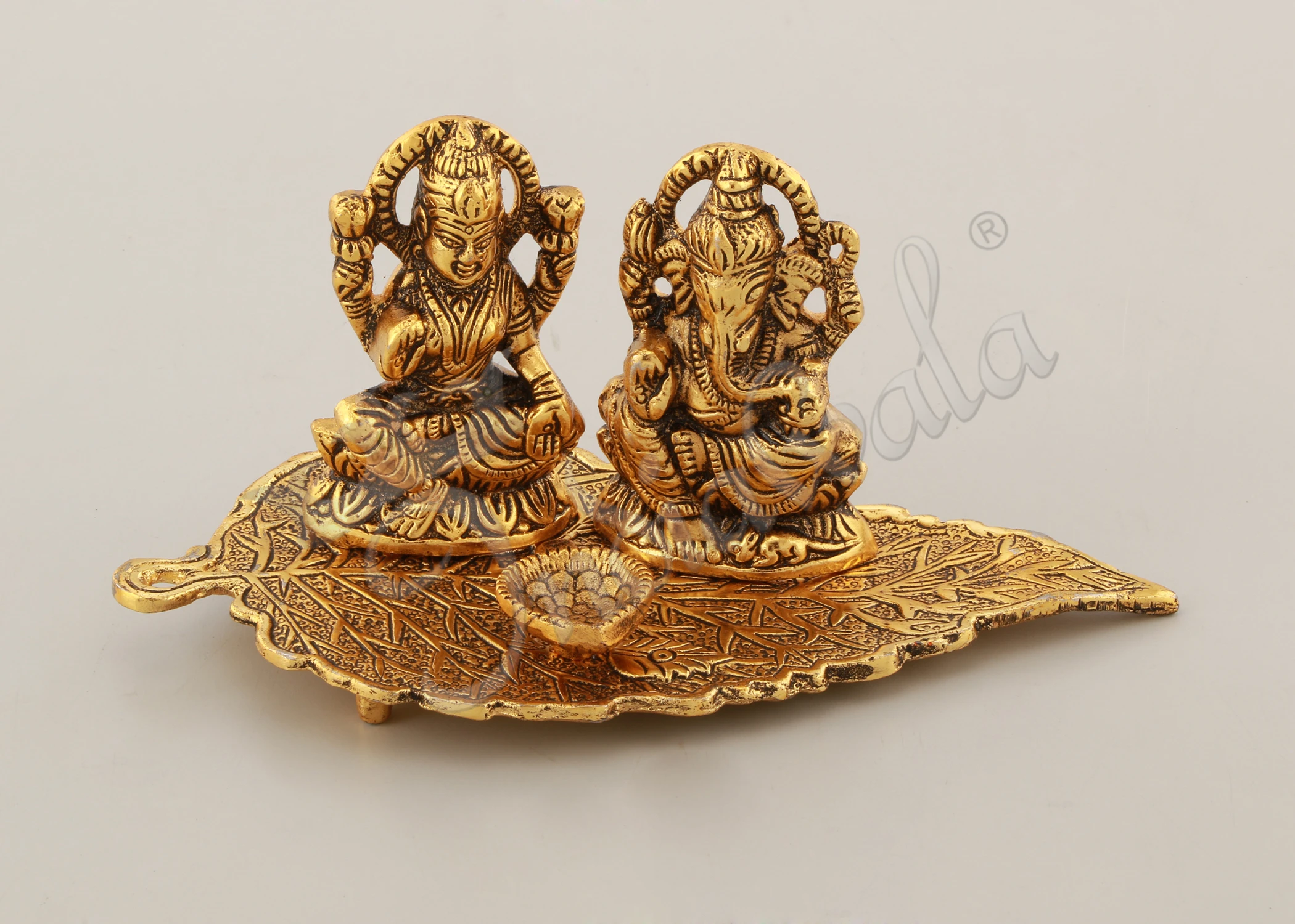 INW-15060 Gold Plated Lakshmi Ganesh Diya on Leaf Base for festive gifting