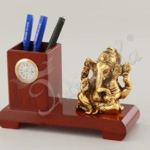 Gold Plated Ganesh Ji Pen Holder on an office desk