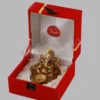 A beautiful 3.75 inch Gold Plated Aluminium Patta Deep Ganesh Velvet Box, showcasing intricate details.