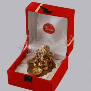 A beautiful 3.75 inch Gold Plated Aluminium Patta Deep Ganesh Velvet Box, showcasing intricate details.