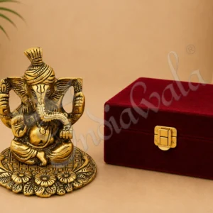 Gold Plated Aluminium Radha Krishna Peacock Idol on a polished wooden base.