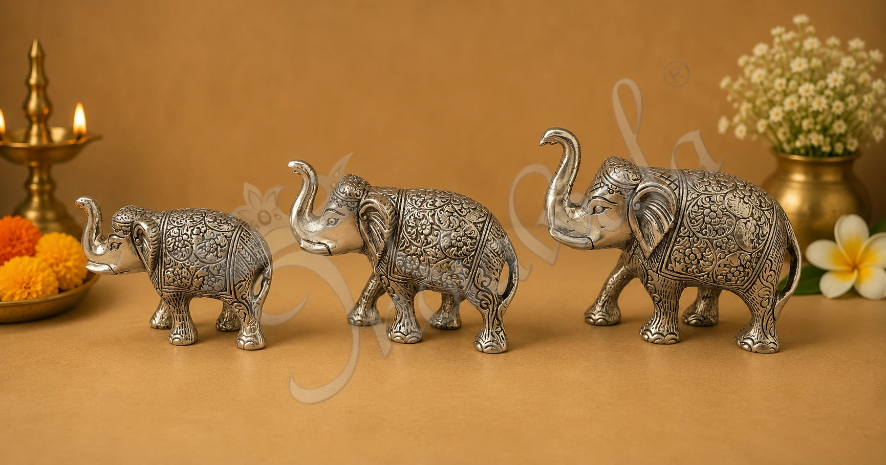 INW-15370-4 Elegant Silver Plated Aluminium Elephant Figurine Set of three pieces for corporate gifting.