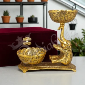 Gold plated aluminium elephant trio in a premium red velvet box