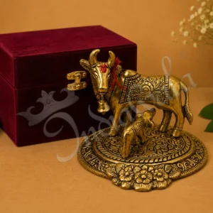 Gold Plated Kamdhenu Cow and Calf Statue in a premium red velvet box