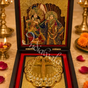 A beautiful 4.5 inch radha krishna charan paduka box made of premium wood.