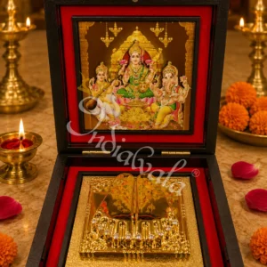 A beautiful 3D laxmi ganesh saraswati charan paduka inside a premium wooden box.