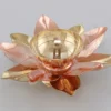 A beautifully handcrafted 3 Inch Brass Copper Lotus Diya with a dual-tone finish.