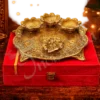 An 8.5 Inch Gold Plated Aluminium Gifting Pooja Thali with Velvet Box, showcasing its elegant design.
