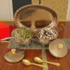 Elegant PVD coated steel bowl set with tray in a velvet box