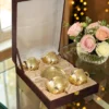 INW-9360_1 A beautiful Brass Finish Cup Plate Set of 4 with Velvet Box, showcasing premium brass craftsmanship.
