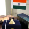 A beautifully crafted 11.75 inch Brass Finish Indian Flag Gift, showcasing intricate details.