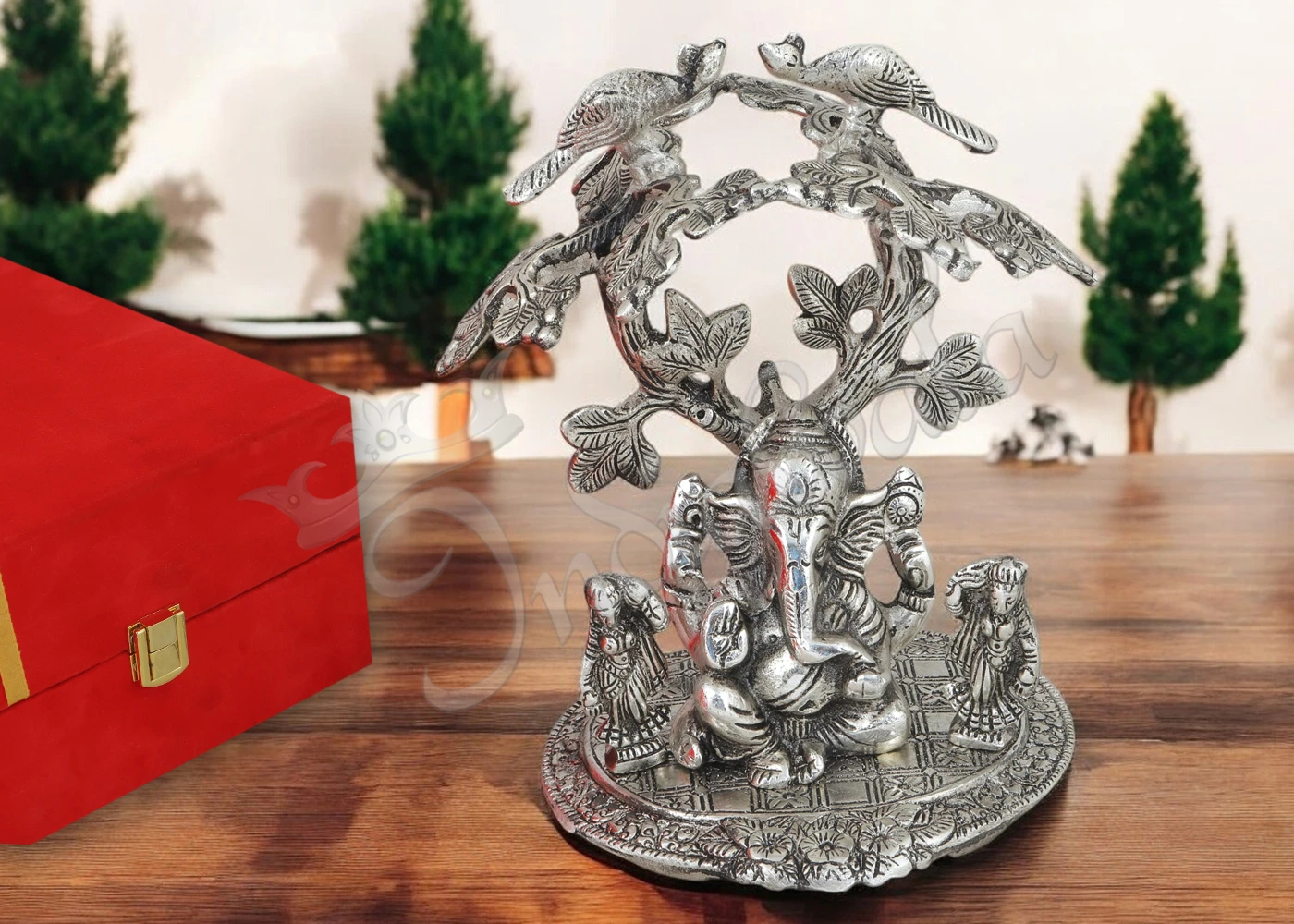 Elegant silver plated riddhi siddhi ganesh idol in a premium red velvet box