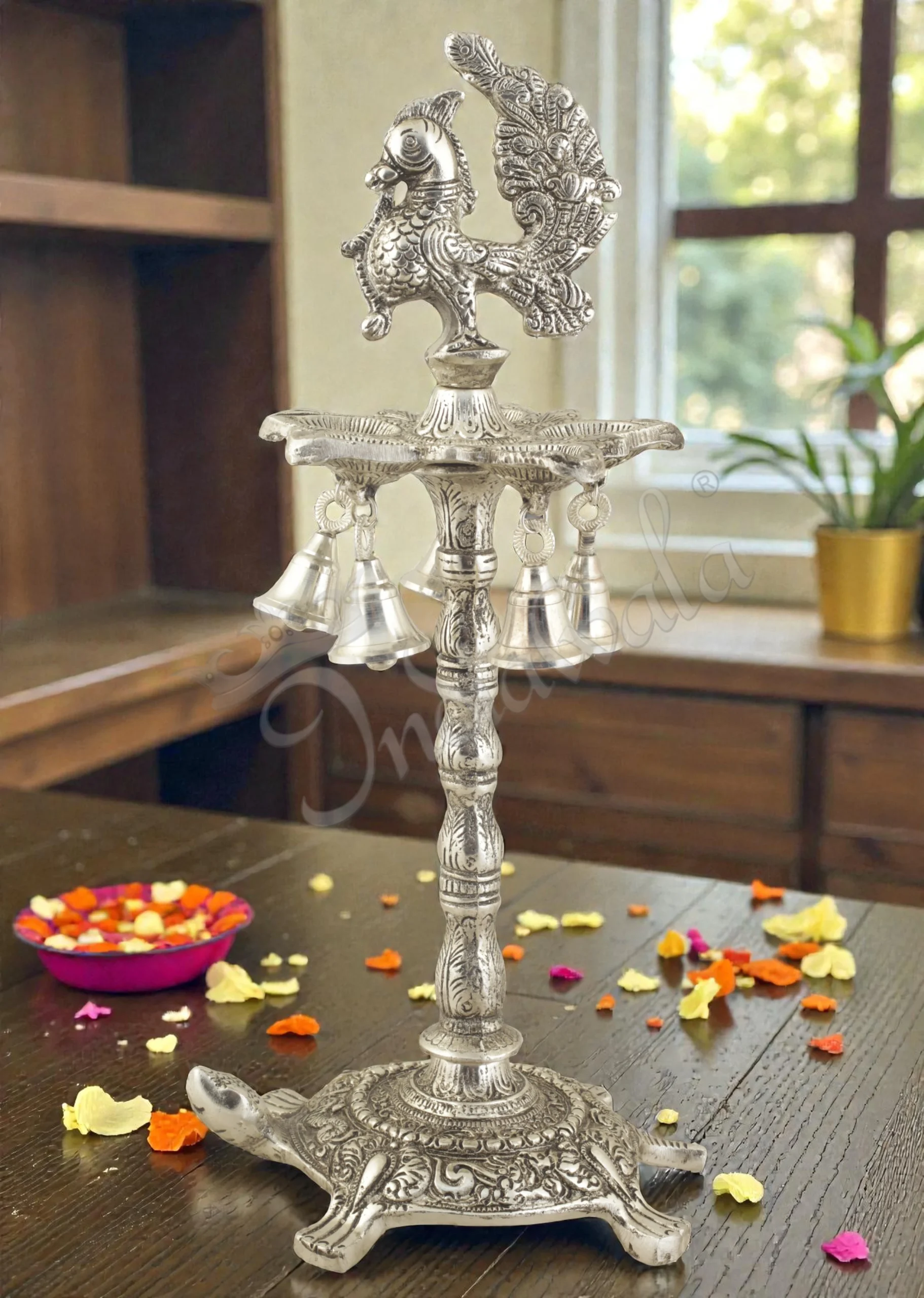 INW-15408 A beautiful 15 Inch Silver Plated Aluminium Peacock Tortoise Diya Stand with intricate detailing.