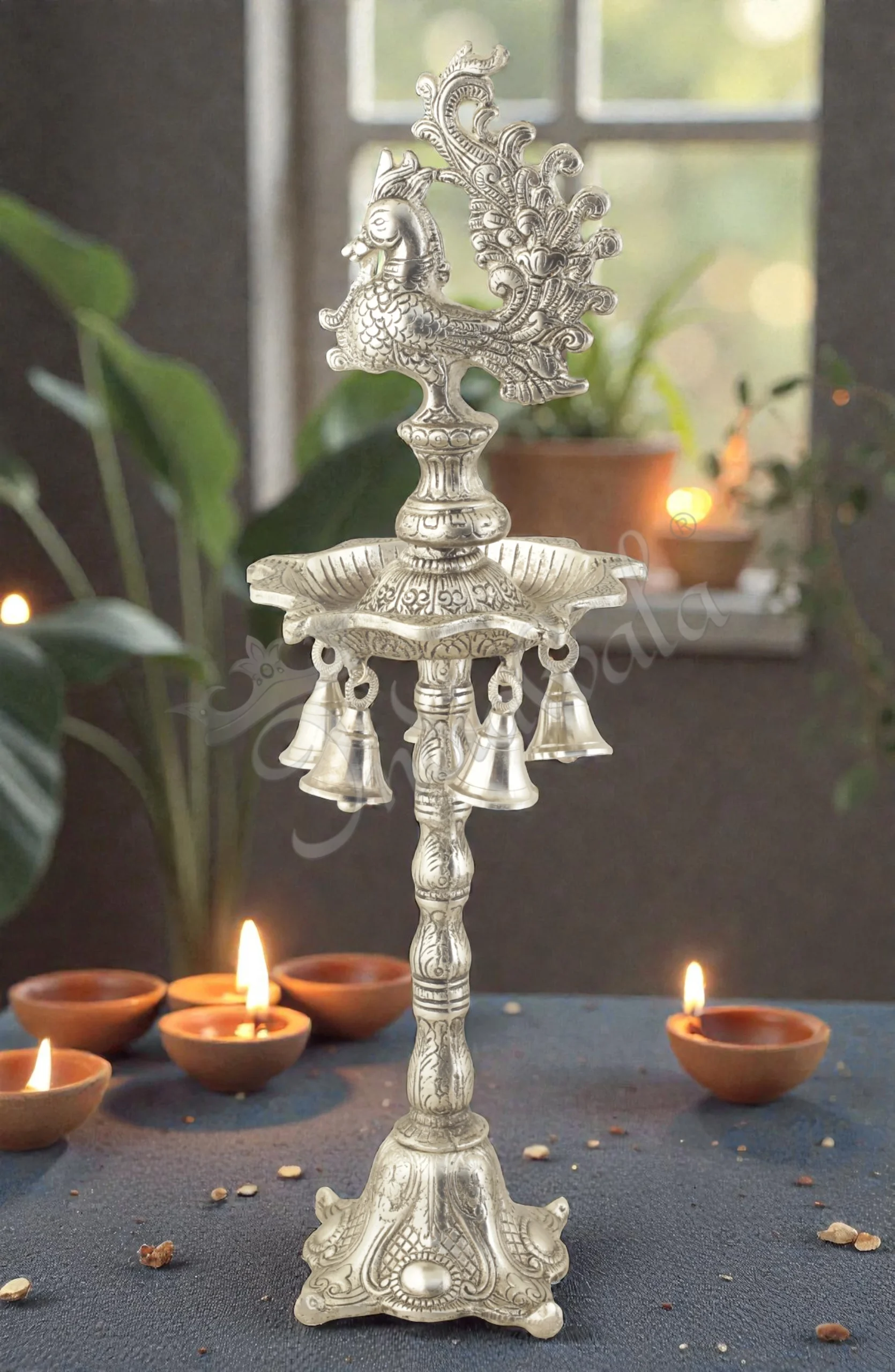 INW-15409 A beautiful 17.5 Inch Silver Plated Aluminium Peacock Diya Stand with intricate detailing.