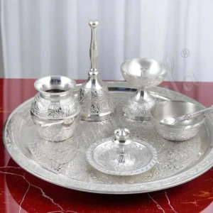 A Traditional 10 Inch Silver Plated Aluminium Pooja Thali, elegantly crafted for spiritual rituals.