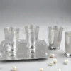 Elegant silver plated steel four glass set with tray in a velvet box