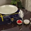 A 7.5 Inch Morpankhi Silver Plated Aluminium Pooja Thali with intricate peacock feather design.