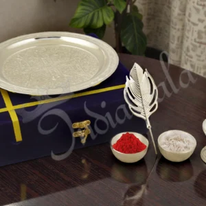 A 7.5 Inch Morpankhi Silver Plated Aluminium Pooja Thali with intricate peacock feather design.