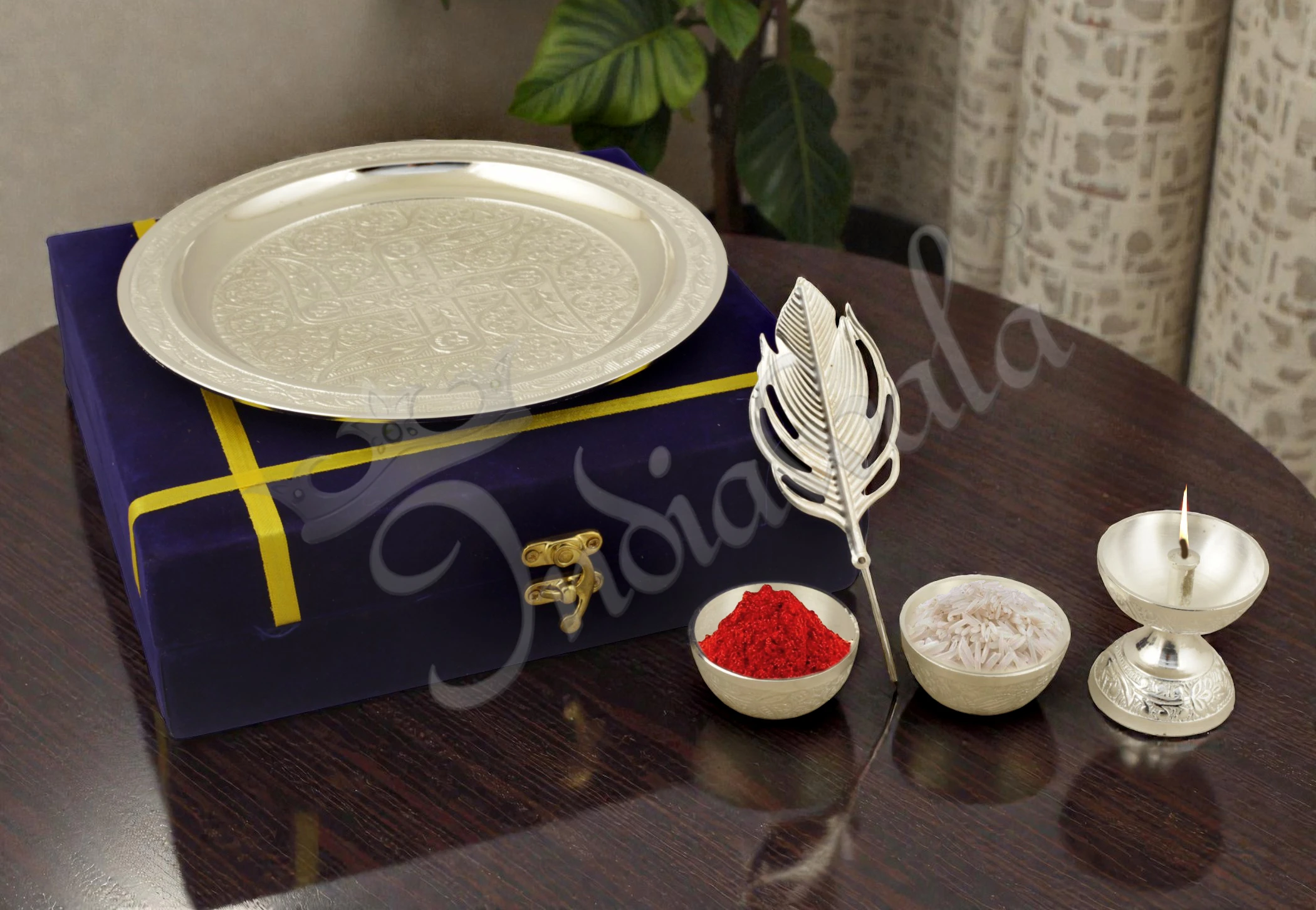 A 7.5 Inch Morpankhi Silver Plated Aluminium Pooja Thali with intricate peacock feather design.