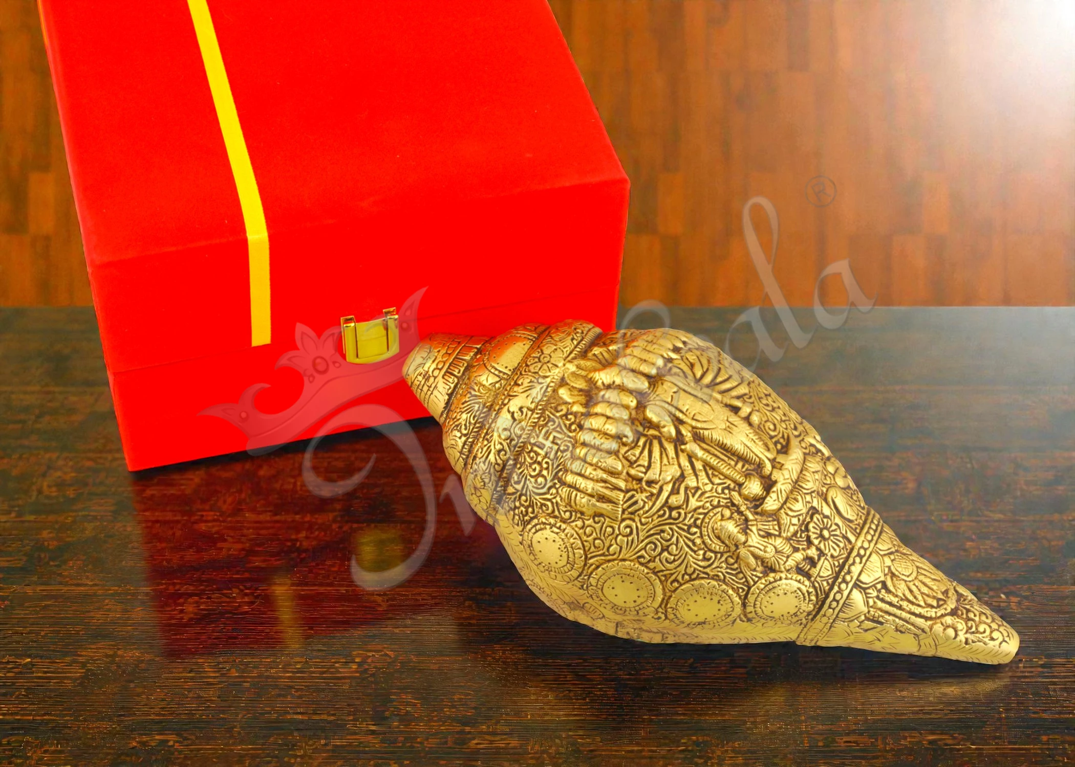 A beautifully crafted 9 inch brass gold plated shankh, presented in a velvet box.
