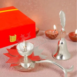 Premium silver plated diya and bell gifting set in a velvet box