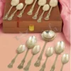 Elegant brass finish velvet box cutlery set with three spoons
