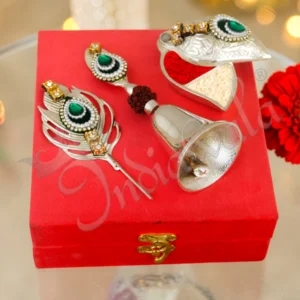 Silver plated aluminium pooja bell set with kum kum holder and morpankhi in a velvet box