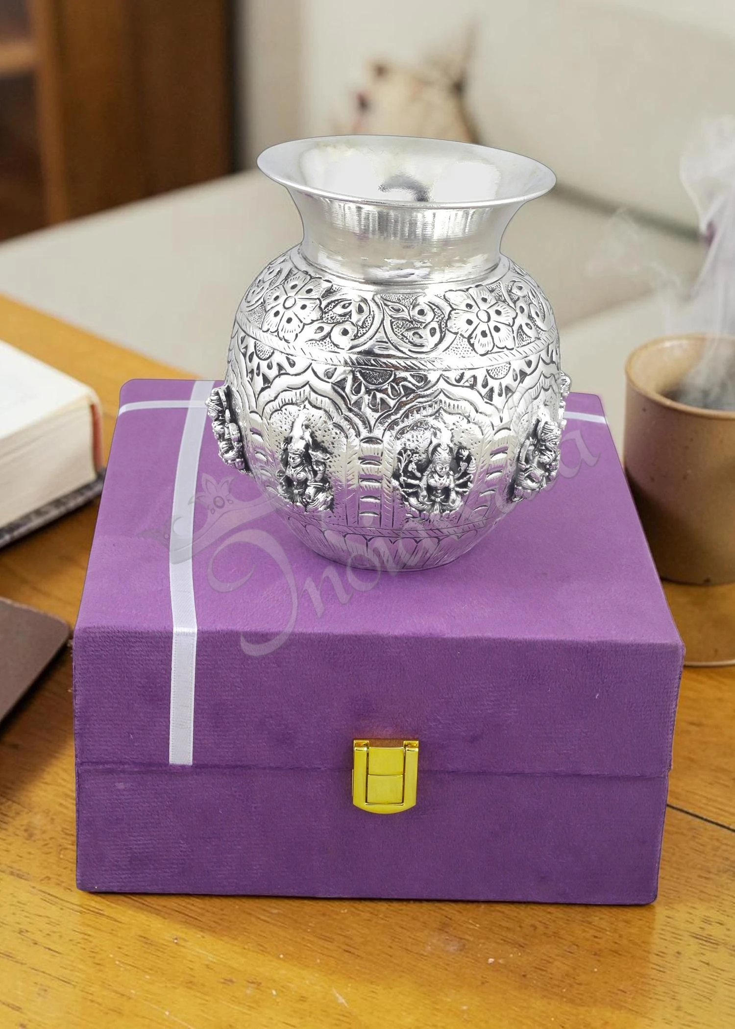 A beautifully handcrafted 4.75 inch silver plated brass Lakshmi pooja lota in a velvet box.