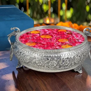 An elegant 11 inch Silver Plated Brass Gifting Urli Pot, handcrafted for premium decor.