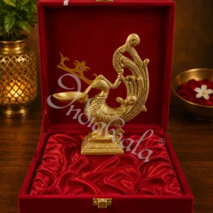 Handcrafted antique brass peacock diya for temple decor