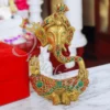 A beautifully crafted 7 Inch Antique Stone Brass Pagdi Ganesh Idol with intricate stone work, perfect for spiritual decor.