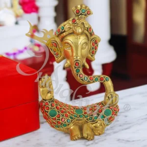 A beautifully crafted 7 Inch Antique Stone Brass Pagdi Ganesh Idol with intricate stone work, perfect for spiritual decor.