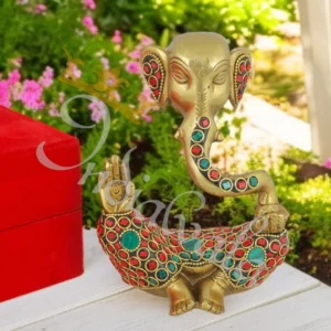 A beautifully handcrafted 4.25x6 Inch Antique Stone Brass Ganesh Gifting Statue with intricate stone work.