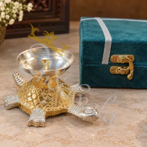 Elegant Dual Tone Aluminium Tortoise Diya for spiritual rituals.