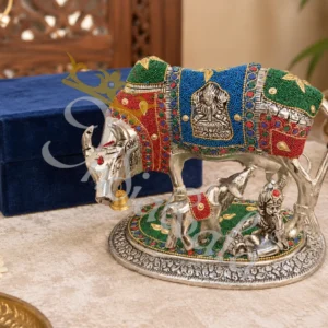 An elegant 8 Inch German Silver Stone Work Kamdhenu statue, crafted from silver-plated aluminium with intricate stone detailing.