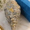 A beautifully crafted 9 inch German Silver Ganesh Shankh Idol, perfect for spiritual decor.