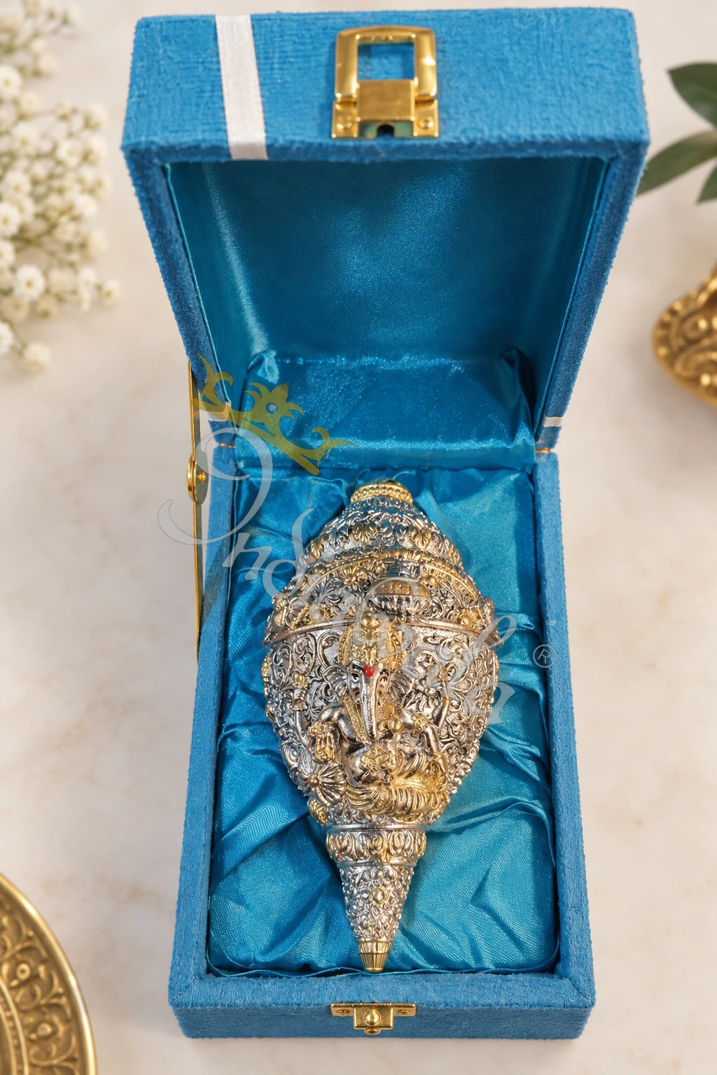 INW-9470_1 A beautifully crafted 9 inch German Silver Ganesh Shankh Idol, perfect for spiritual decor.