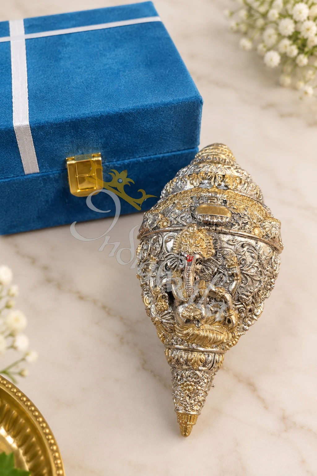 INW-9472 A beautiful 5.5 Inch German Silver Ganesh Pooja Shankh, intricately designed.