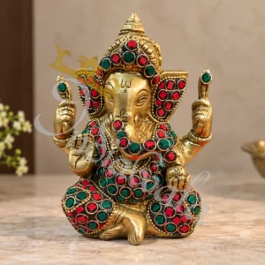 A beautifully handcrafted 5.5 Inch Brass Stone Work Ganesha Gifting Statue, featuring intricate detailing and a premium finish.