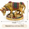 INW-9474_2 A beautifully crafted Brass Stone Work Kamdhenu Gifting Statue, adorned with colorful stones.